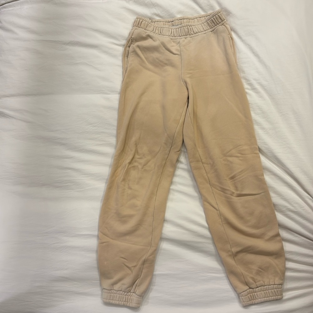 Cotten Citizen beige sweatpants.